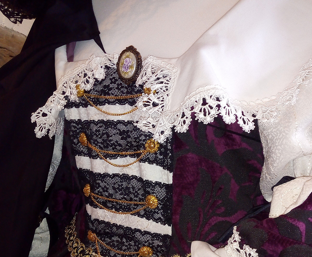 Detail of the Milady’s costume