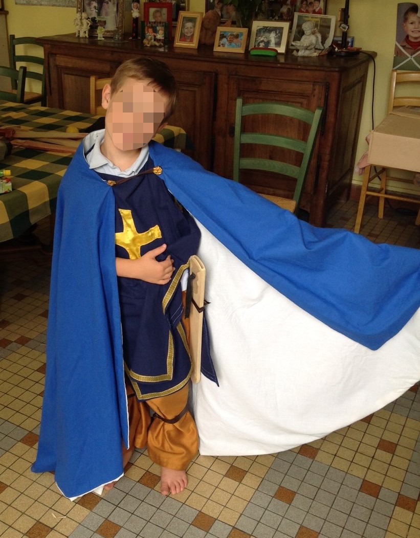 Blue caped crusader knight’s costume